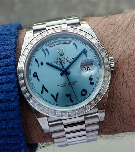 Rolex watch with arabic numbers